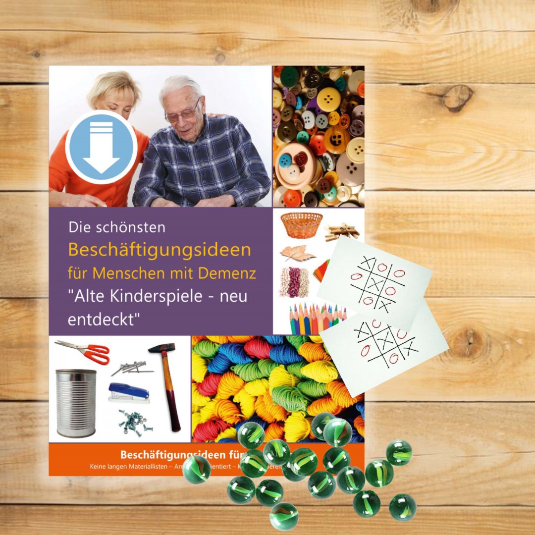 PDF-Cover zu „Die schönsten Beschäftigungsideen für Menschen mit Demenz. Kinderspiele“. Auf dem Cover sind Murmeln als Symbole für Spiele von früher.